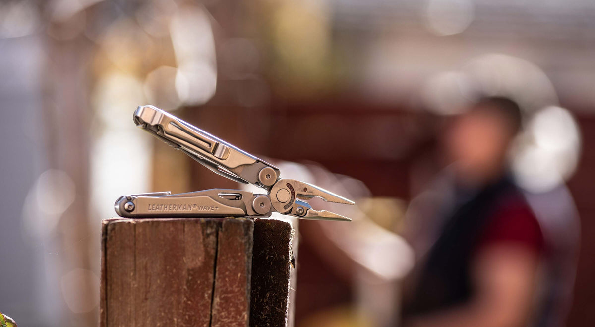 Leatherman Wave opened in pliers position laying on its side