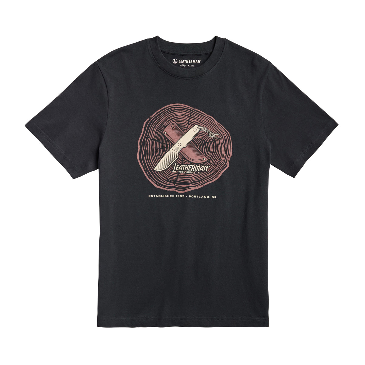 Translation missing: en.Front of the black Leatherman Blade &amp; Grain tee  showcasing a fix blade knife and leather sheath on a stump