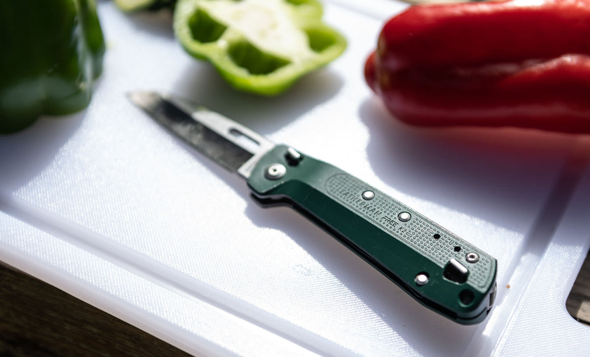 Translation missing: en.K2 on a cutting board surrounded by vegetables