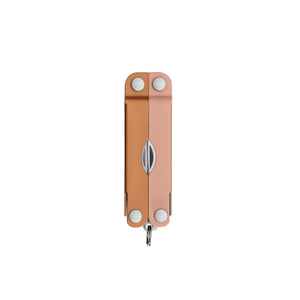 Translation missing: en.Closed Micra® multitool in Ginger Peach with visible hinge screws and small keychain loop