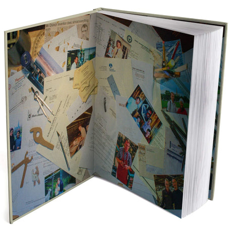 Translation missing: en.The Leatherman Book open to its endpaper collage of archival Leatherman letters, patents and photographs